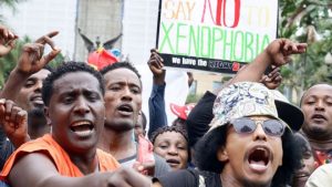 Protestors take part in an anti-xenophobic march in South Africa last month. More can be found on BBC.com