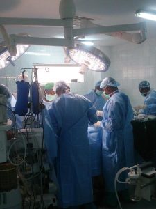 Surgeons at Abuja National Hospital in Nigeria prepare an 8-year-old patient for surgery. 