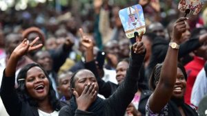 Pilgrims cheer for Pope Francis in Uganda.